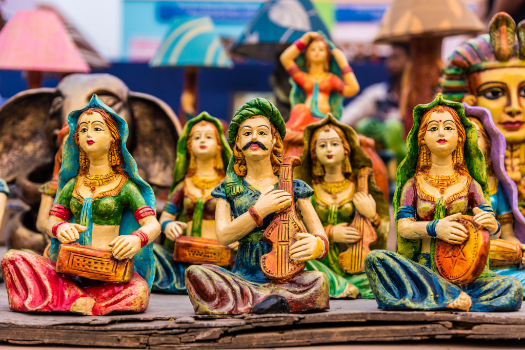 Beautiful clay dolls of miniature folk musicians performing in a band of classical Indian music